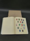 A collection of mainly mint GB stamps in a Simplex album.