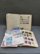 A collection of all world stamps in two albums together with a quantity of first day covers