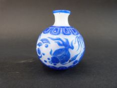 Chinese Beijing cameo overlaid glass bottle vase decorated in blue with fish and foliage over a