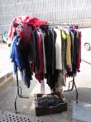 Over eighty items of clothing consisting of knitwear, evening dresses etc some with Jane Norman,