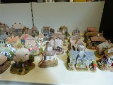 A collection of Lilliput Lane cottages