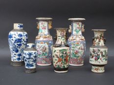 A pair of 19thC Chinese famille rose vases,