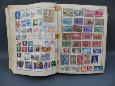 A Triumph stamp album and contents.