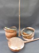Two hammered copper coal scuttles,