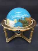 A pietra dura globe with pale blue sea,