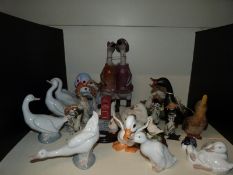 A collection of various duck figures to include Nao, The Duck Company,