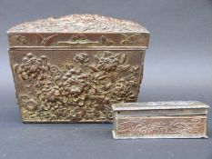 A Japanese embossed metal casket with gilt decoration and one similar smaller example,