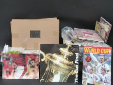 A large collection of football related books,