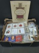 A collection of cigarette cards including Wills, Players,