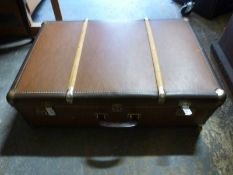 A vintage ash bound suitcase
