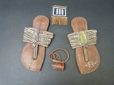 A pair of tribal leather and woven sandals,