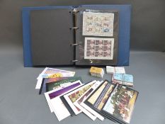 A stockbook of mini sheets, booklets, blocks etc,