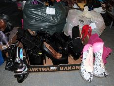 Thirty four pairs of shoes to include platforms, stilettos etc two pairs in original boxes,
