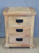A hardwood bedside chest of three drawers (W55 x D44 x H72cm)