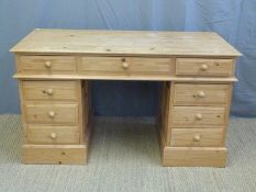 A pine twin pedestal desk (W138 x D63 x H79cm)