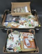 A large collection of loose cigarette and trade cards, albums etc.