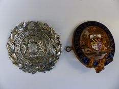 A Manchester Ship Canal enamel badge and similar police badge