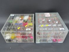 Two perspex three sectional drawer chests containing a large quantity of fishing flies