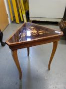 An inlaid Sorrento ware musical sewing table (height 43cm)