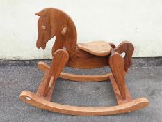 An elm and ash rocking horse probably Tiger Tiger of London