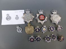 A collection of Welsh Police badges including Gwent, Powys,