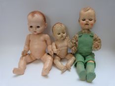 Three Pedigree dolls, all with weighted eyes and jointed bodies, one in green overalls,