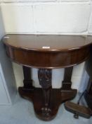 A Victorian mahogany demi-lune hall table (H70 x W73cm)