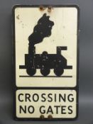 A vintage railway 'crossing no gates' road sign,
