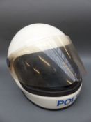 Three police motorcycle helmets including one American with Albany police sticker