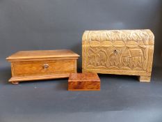 A carved wooden casket,