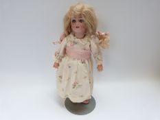 Simon & Halbig bisque headed doll with open mouth, weighted blue eyes,