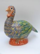 An oriental style porcelain crock in the form of a turkey (40cm tall)