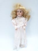 Societe Francaise de Fabrication de Bebes et Jouets (SFBJ) bisque headed doll with open mouth,