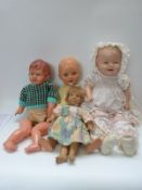 Four various dolls including one marked Nines D'Onil, one Japanese and one marked MH,