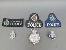 Police badges relating to Guernsey,