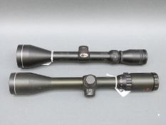 Two SMK rifle scopes one 4-12x42 the other 3-9x50