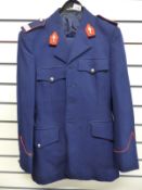 A Belgian police officer's uniform comprising tunic trousers and hat