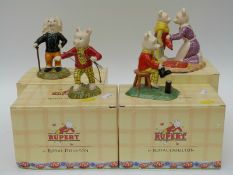 Four Royal Doulton Rupert Bear figures including Out for the Day, Leading the Way,