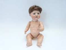 Baer & Proeschild bisque headed doll with open mouth, weighted blue eyes,