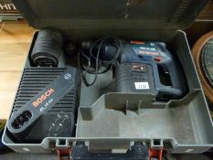 A cased Bosch GBH24 VRE cordless SDS drill