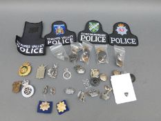 A collection of vintage police buttons including Reading,