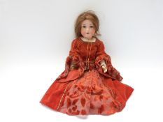 Armand Marseille bisque headed doll with open mouth, weighted blue eyes,