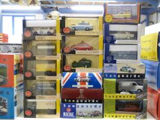 Seventeen Vanguards diecast model vehicle sets, including police cars, lorries,