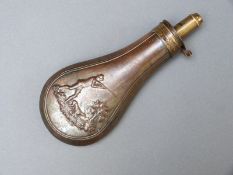 Copper and brass powder flask with embossed decoration of a man shooting with his dog,