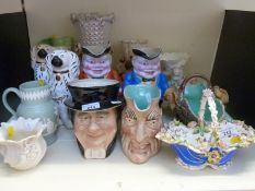 A collection of ceramics including Coalbrookdale style basket, Sarreguemines character jug,