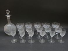 A late 19thC suite of cut glassware including sherry,