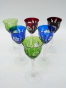 A set of six overlaid and cut glass coloured hock glasses