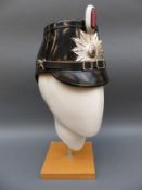 Three European police helmets including French and Belgian examples