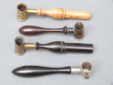 Four brass and white metal shot/powder measures by James Dixon & Sons and similar,
