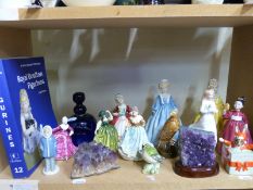 A collection of porcelain figures including two Royal Worcester Grandmother's Dress,